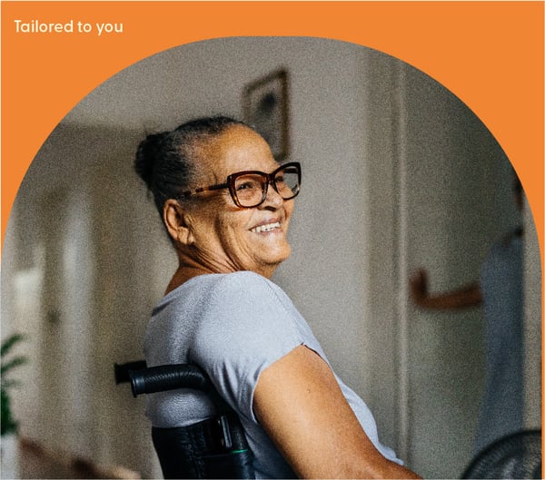 Senior in a wheelchair smiling