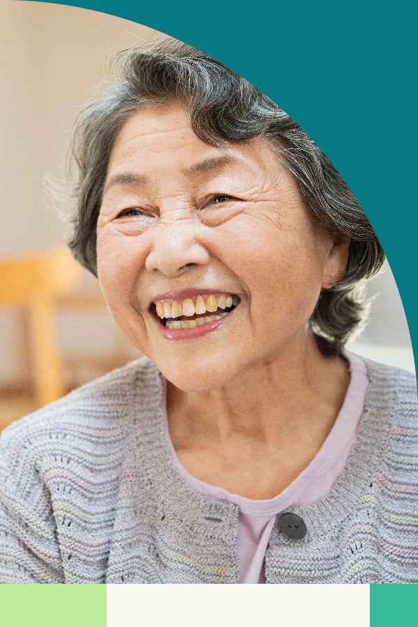 Happy elderly lady smiling